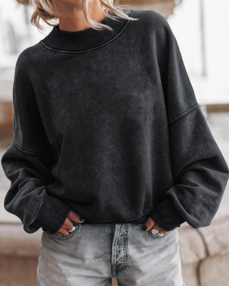 Pull blanc élégant et moderne à manches bouffantes