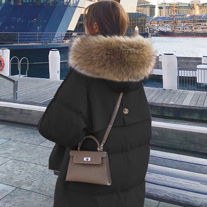 Doudoune hiver femme bordée de fourrure élégante