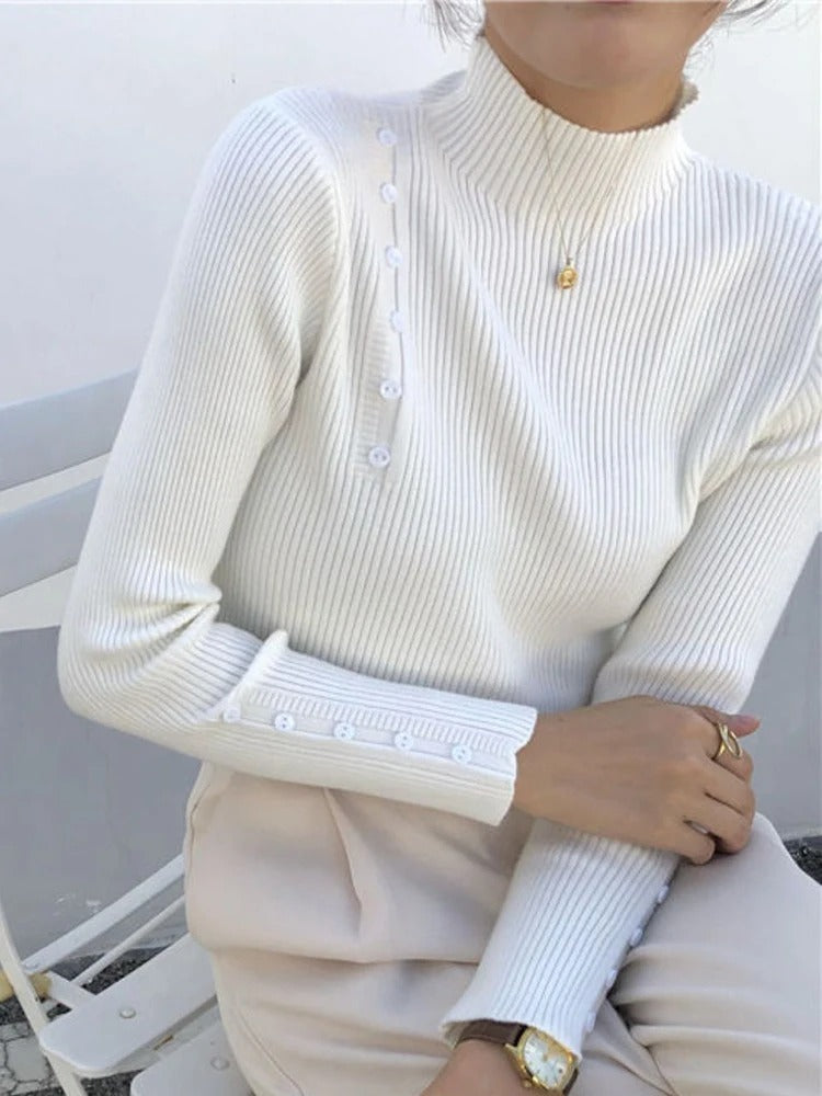 Pull élégant avec boutons et col montant