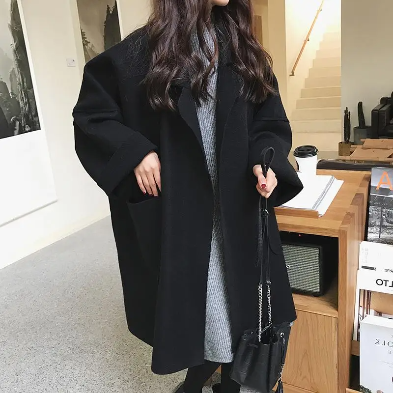 Manteau en laine oversize avec poches et coupe confortable