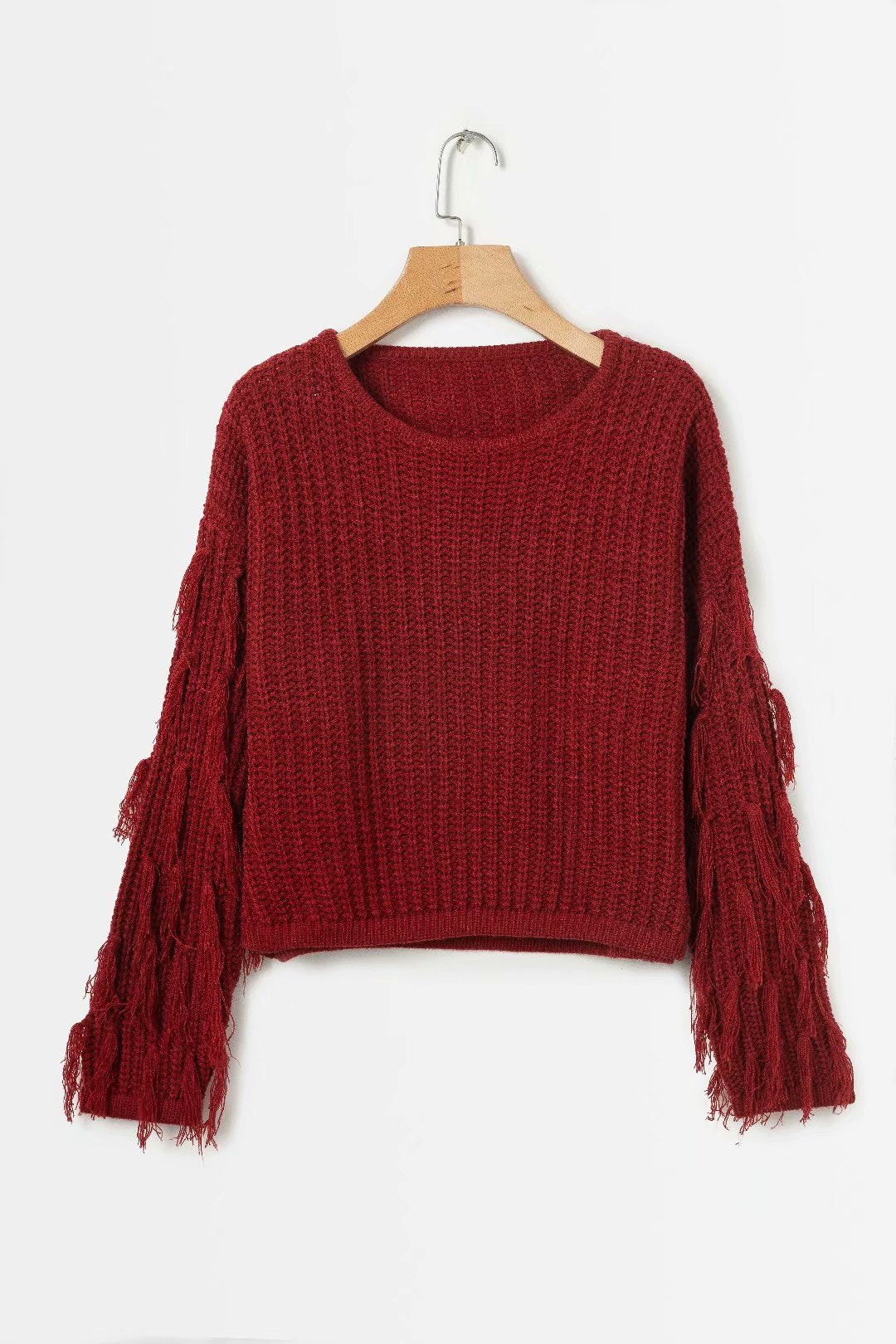 Pull femme mode tricot torsadé manches à franges
