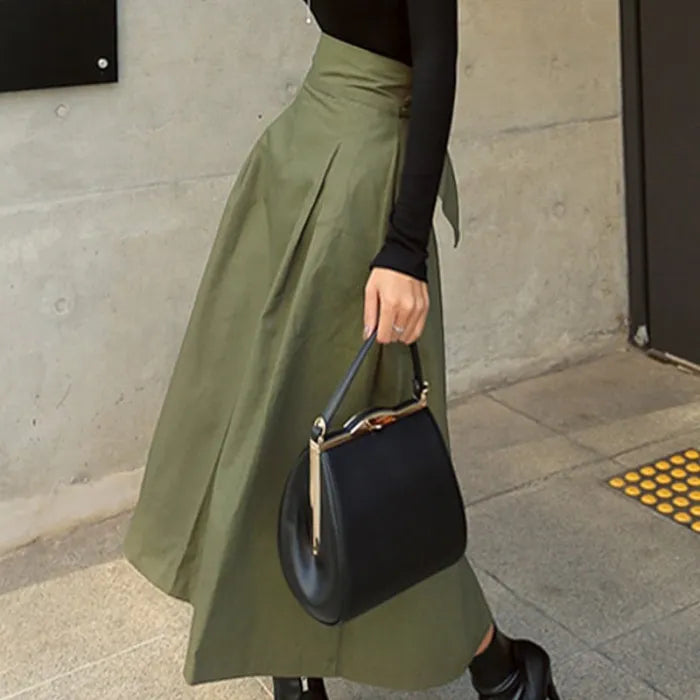 Jupe midi élégante taille haute avec nœud