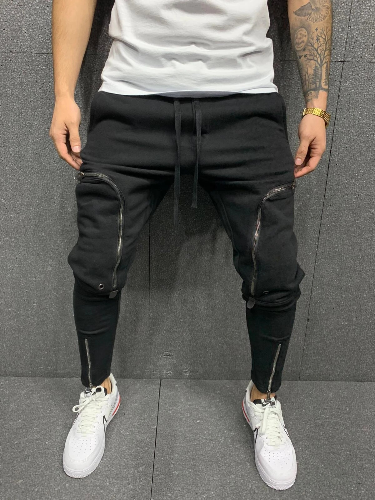 Pantalon de jogging homme style moderne détail fermeture éclair