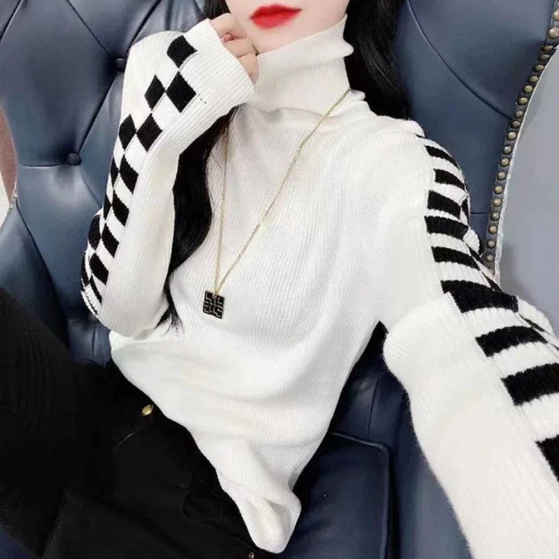Pull en maille stylé à col roulé et carreaux