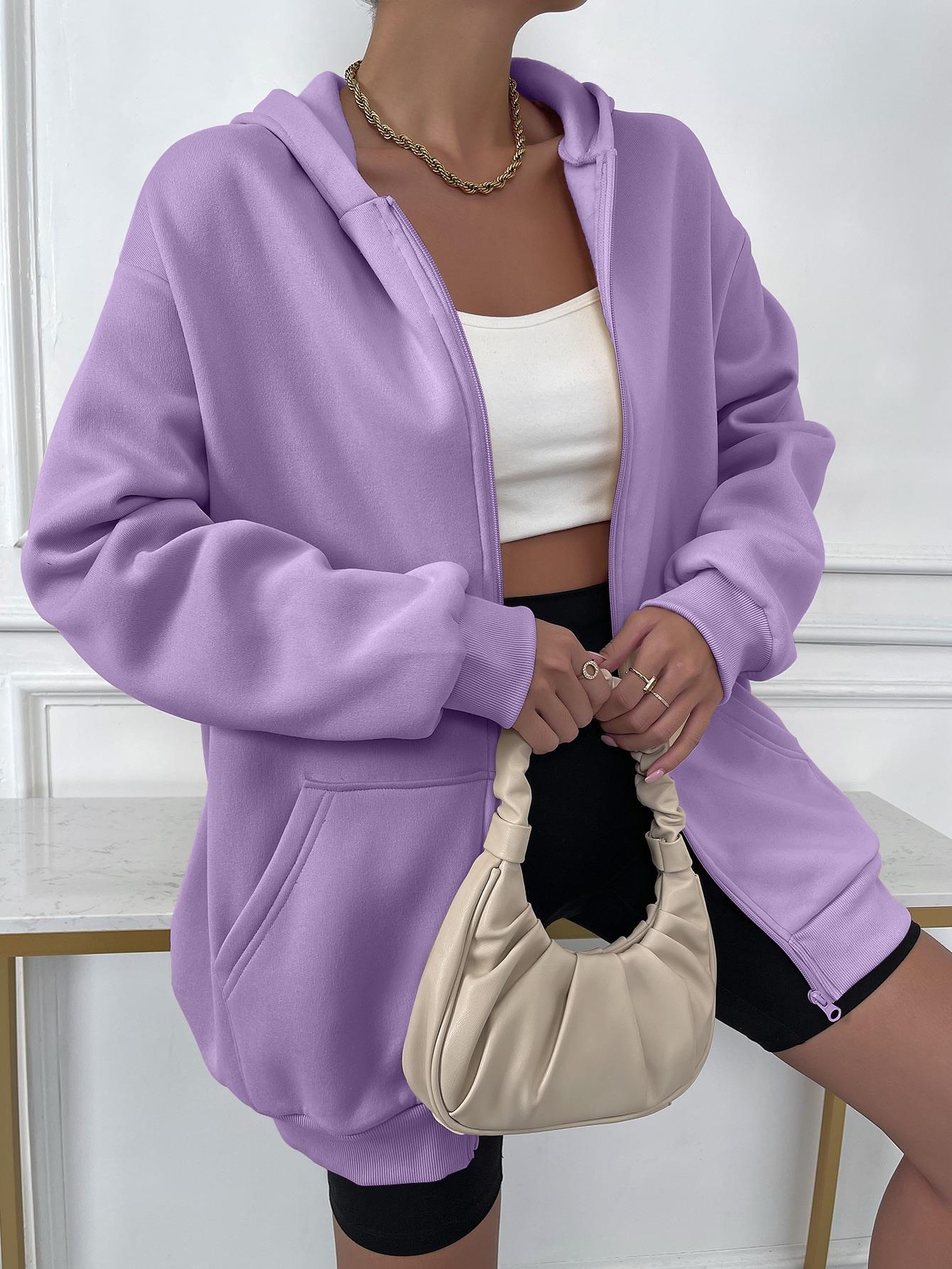 Gilet femme élégant avec capuche et fermeture éclair