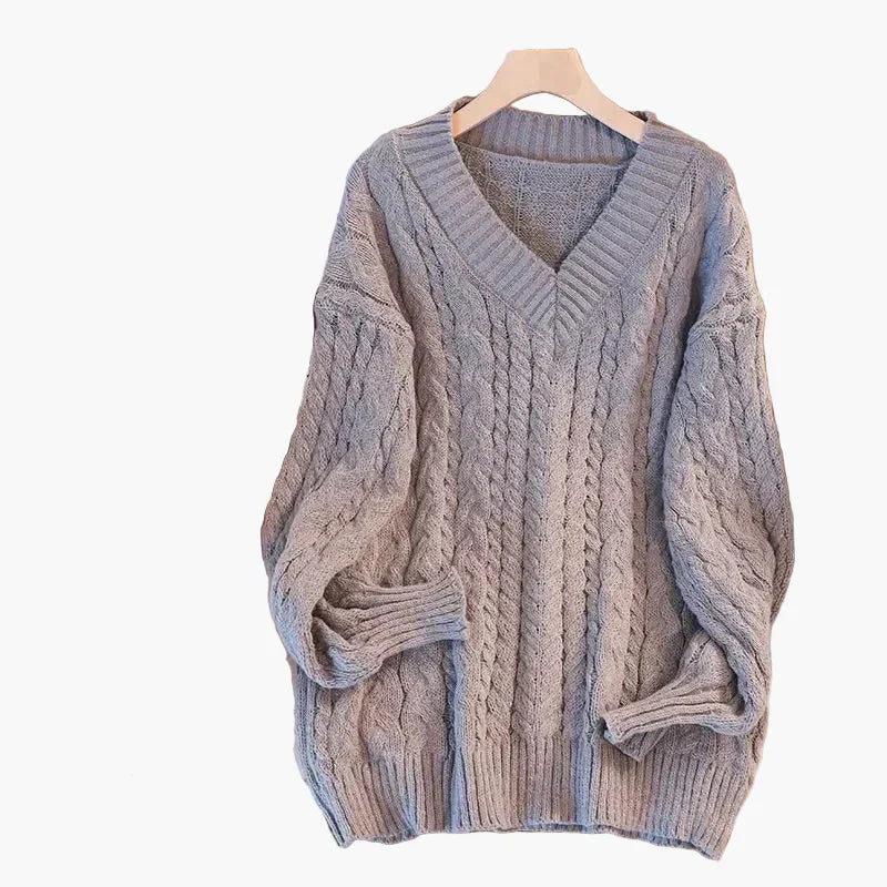Pull en grosse maille col V motif torsadé hiver