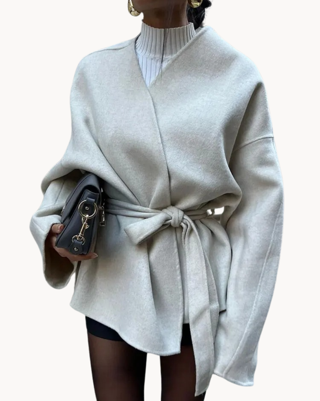 Veste cintrée pour femme avec ceinture et design chic