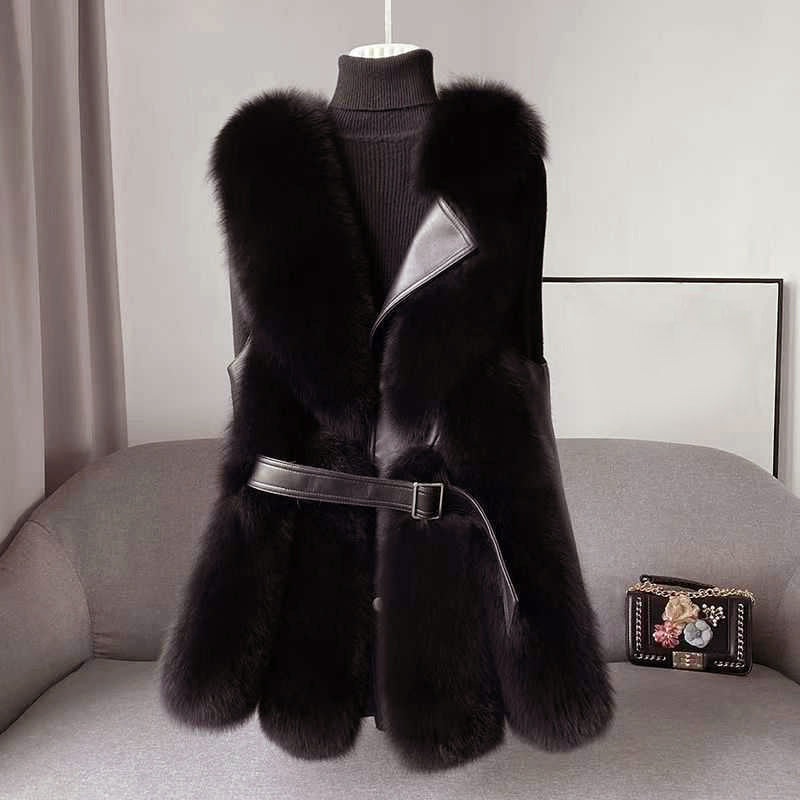 Gilet stylé en fausse fourrure avec fermeture en cuir