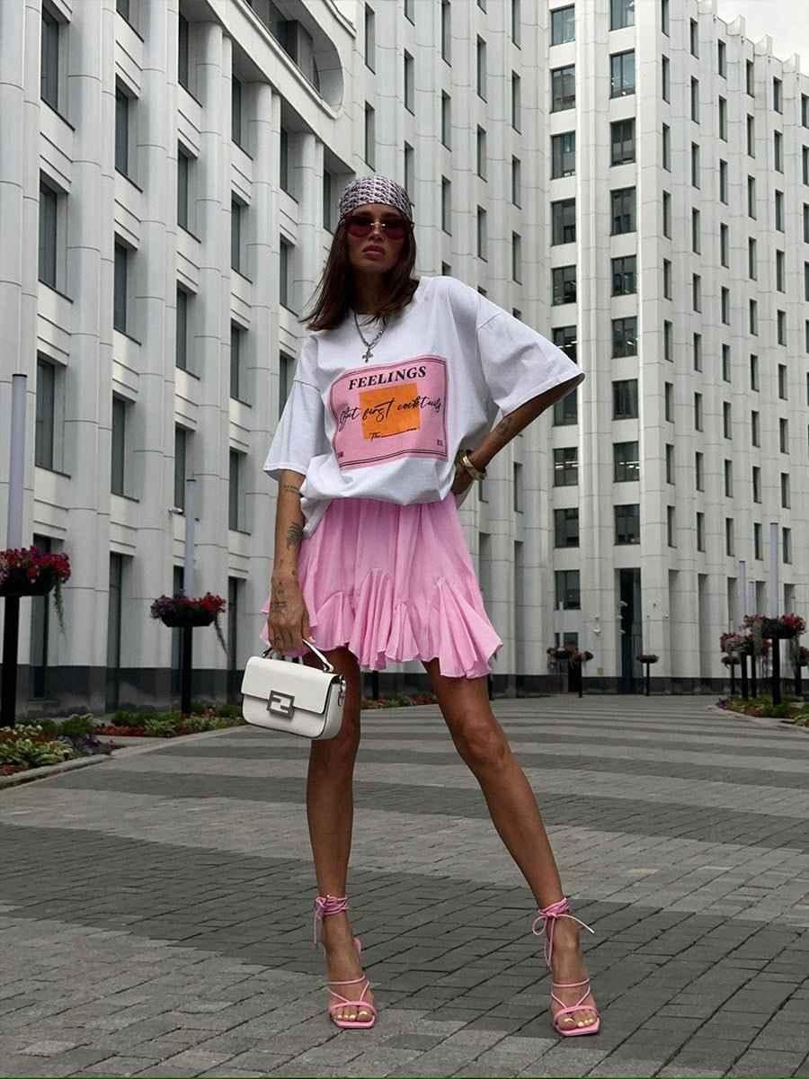 Mini-jupe courte taille haute avec ourlet à volants pour femme