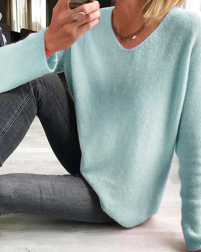 Élégant pull uni à manches longues