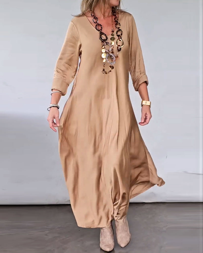 Robe élégante col V jupe patineuse