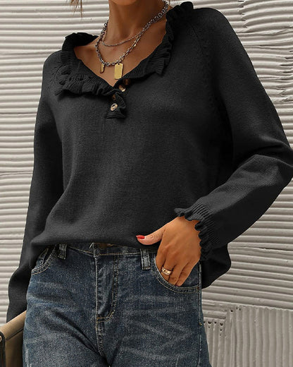 Pull uni élégant avec détail volanté