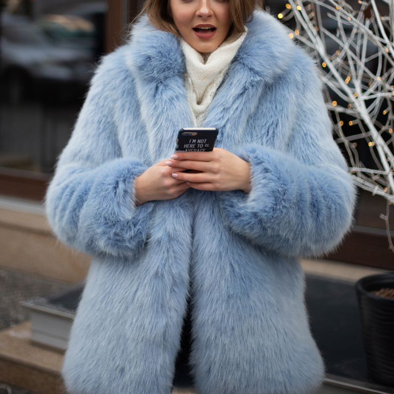 Manteau femme élégant en fausse fourrure volumineuse