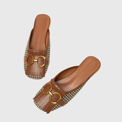 Sandales claquettes femme boucle moderne