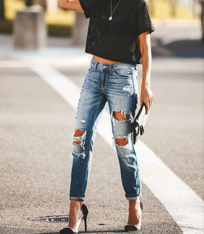 Jean déchiré femme coupe slim avec détail franges