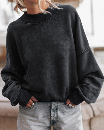 Pull blanc élégant et moderne à manches bouffantes