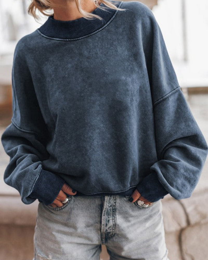 Pull blanc élégant et moderne à manches bouffantes