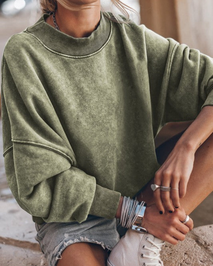 Pull blanc élégant et moderne à manches bouffantes
