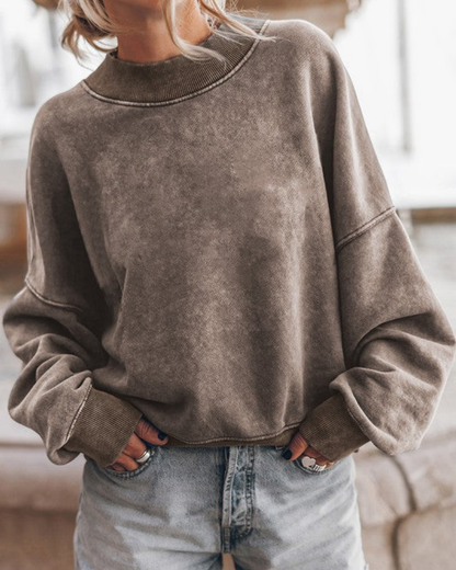 Pull blanc élégant et moderne à manches bouffantes