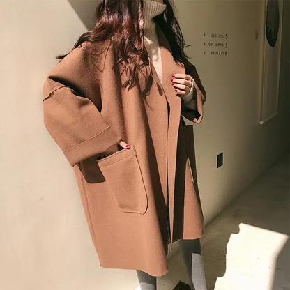 Manteau en laine oversize avec poches et coupe confortable