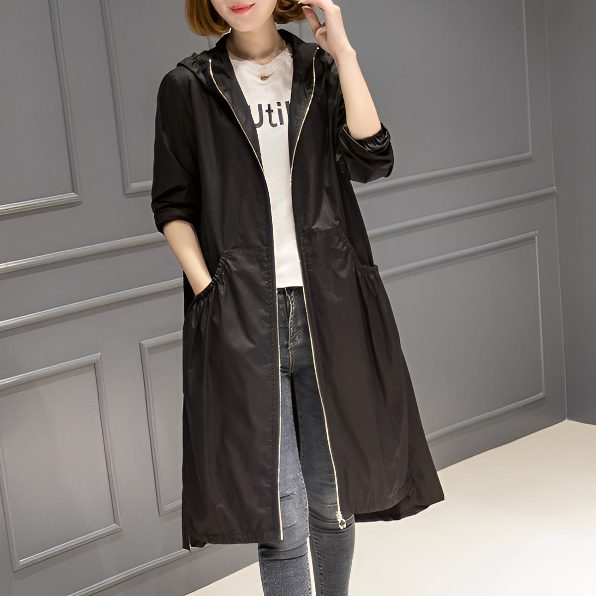 Imperméable femme élégant à capuche