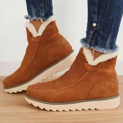 Bottes fourrées en peau de mouton souple pour femme