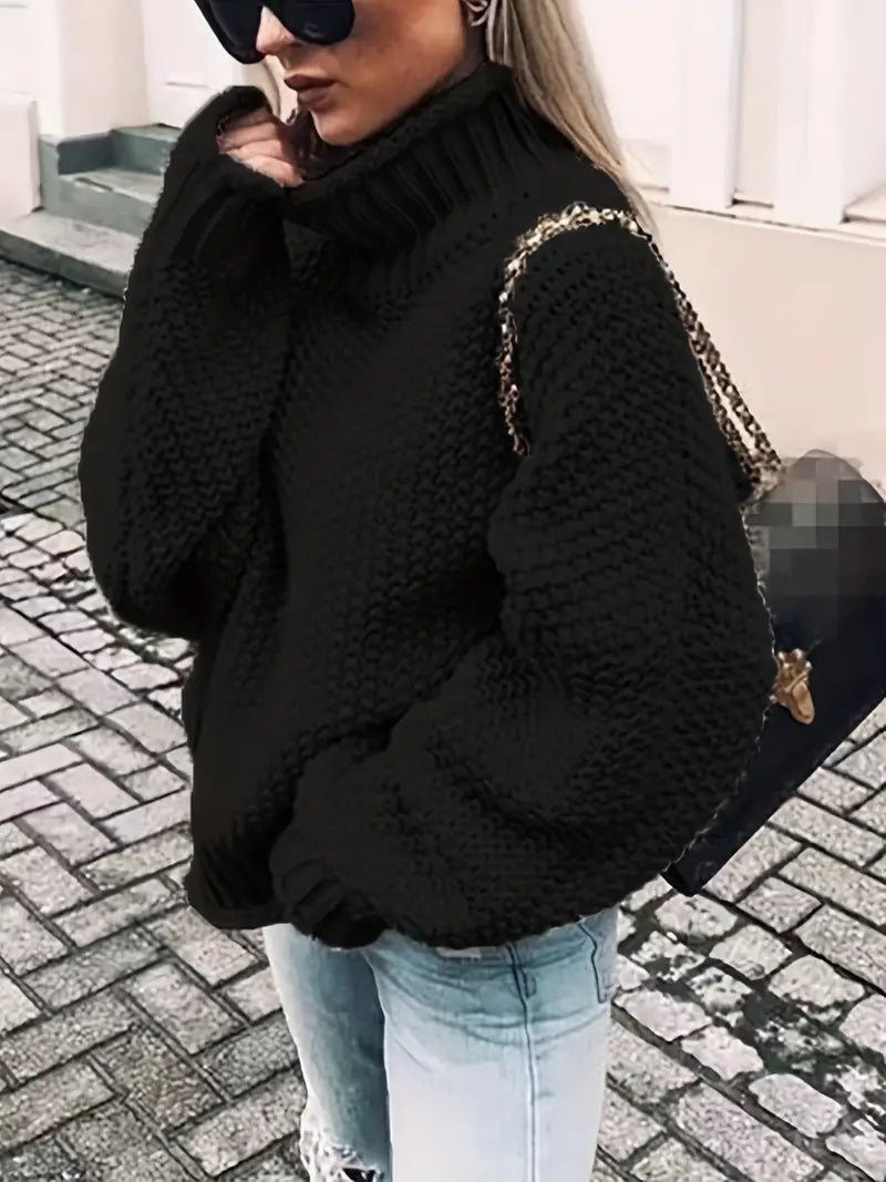 Pull col roulé uni et élégant