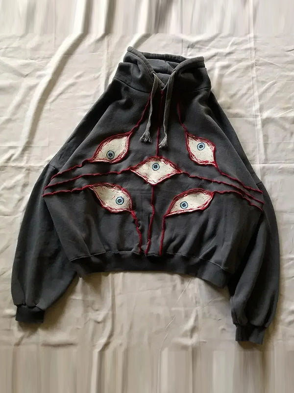 Hoodie oversize stylé avec des yeux amusants