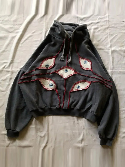Hoodie oversize stylé avec des yeux amusants