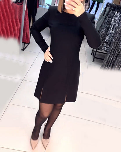 Robe élégante fendue à manches longues