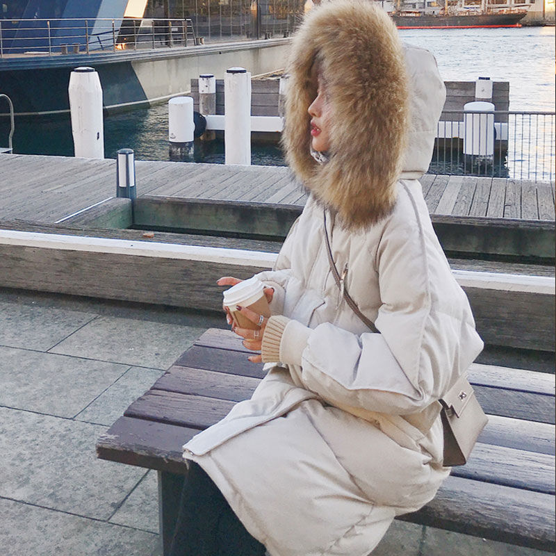 Doudoune hiver femme bordée de fourrure élégante
