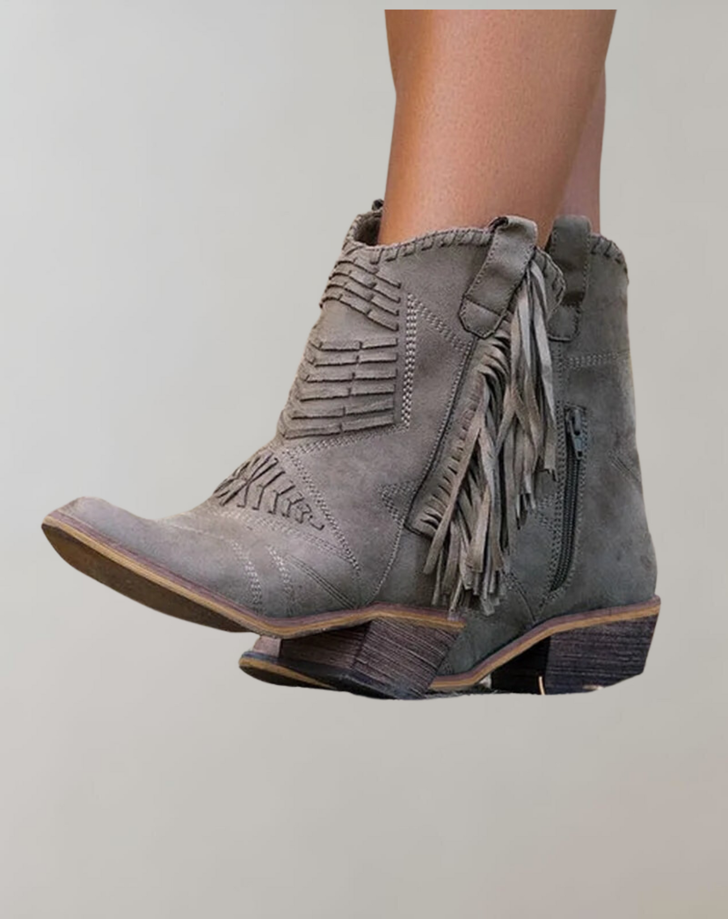 Bottes élégantes avec détails frangés