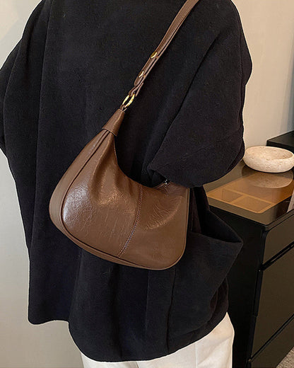 Élégante veste en cuir épaulettes