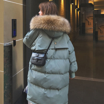 Doudoune hiver femme bordée de fourrure élégante