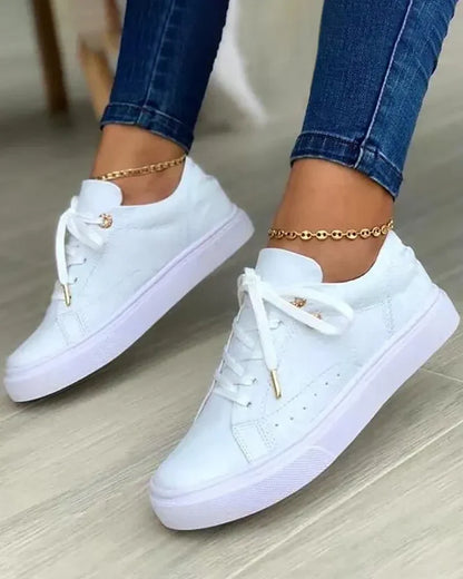 Baskets chics avec accents dorés