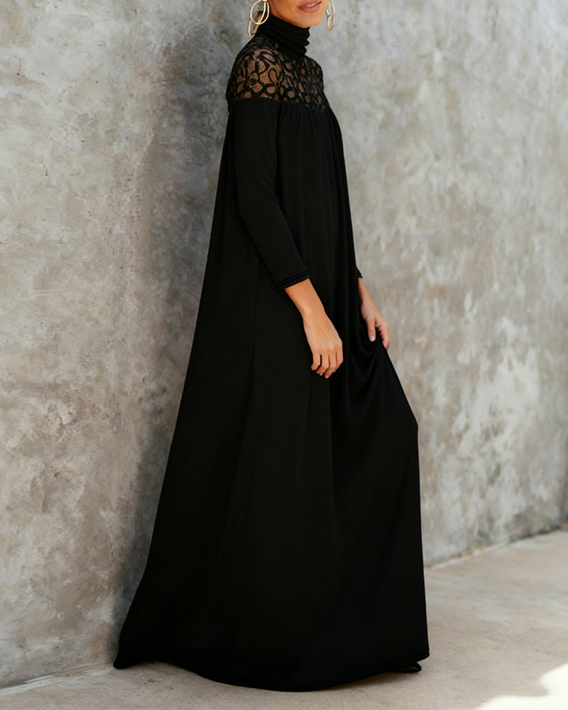 Robe élégante avec col montant et patchwork en maille