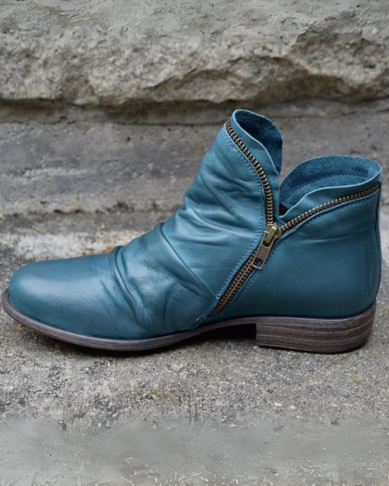 Bottes élégantes en cuir avec fermeture éclair