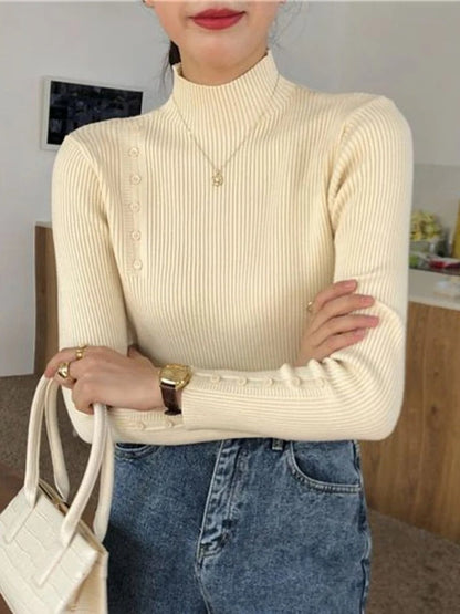 Pull élégant avec boutons et col montant