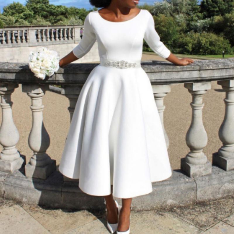 Élégante robe midi femme col rond Coupe