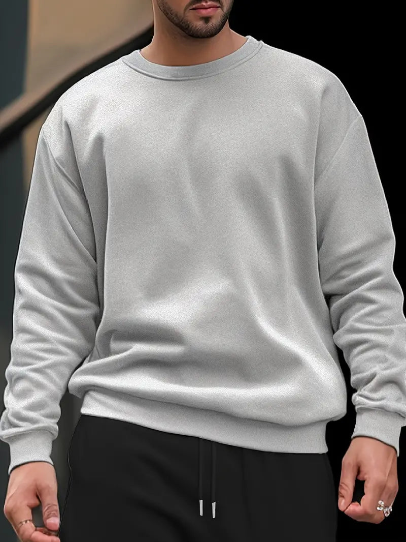 Pull col rond uni homme