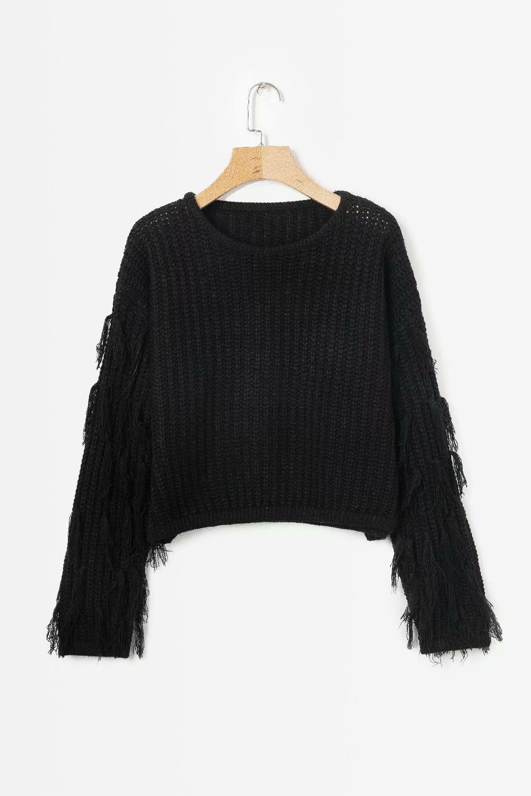 Pull femme mode tricot torsadé manches à franges