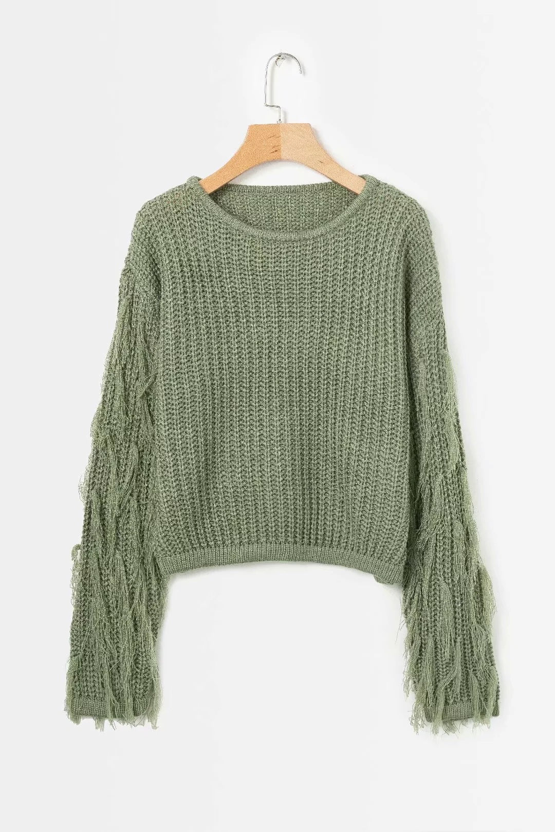 Pull femme mode tricot torsadé manches à franges