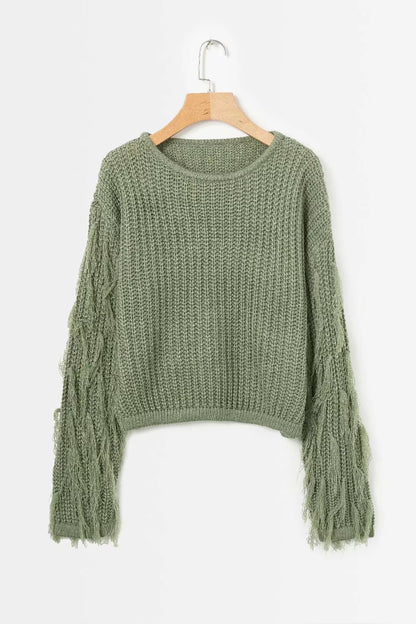 Pull femme mode tricot torsadé manches à franges