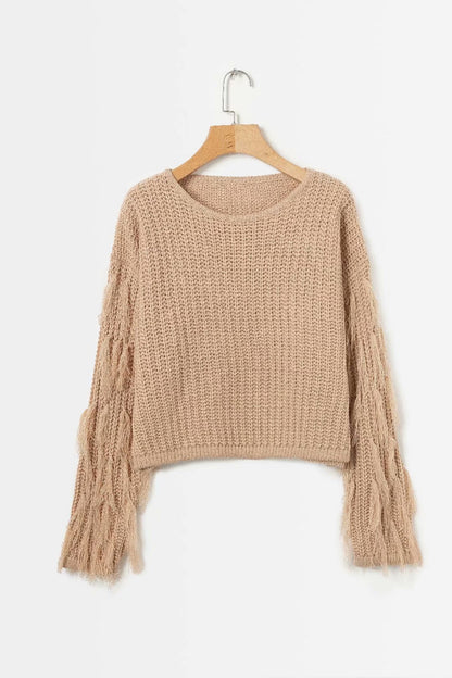 Pull femme mode tricot torsadé manches à franges