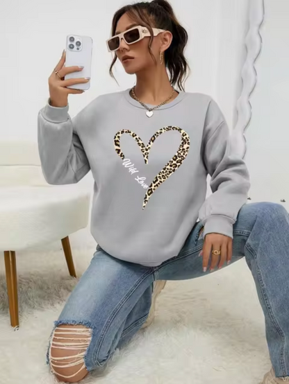 Pull tendance à motif léopard et cœur