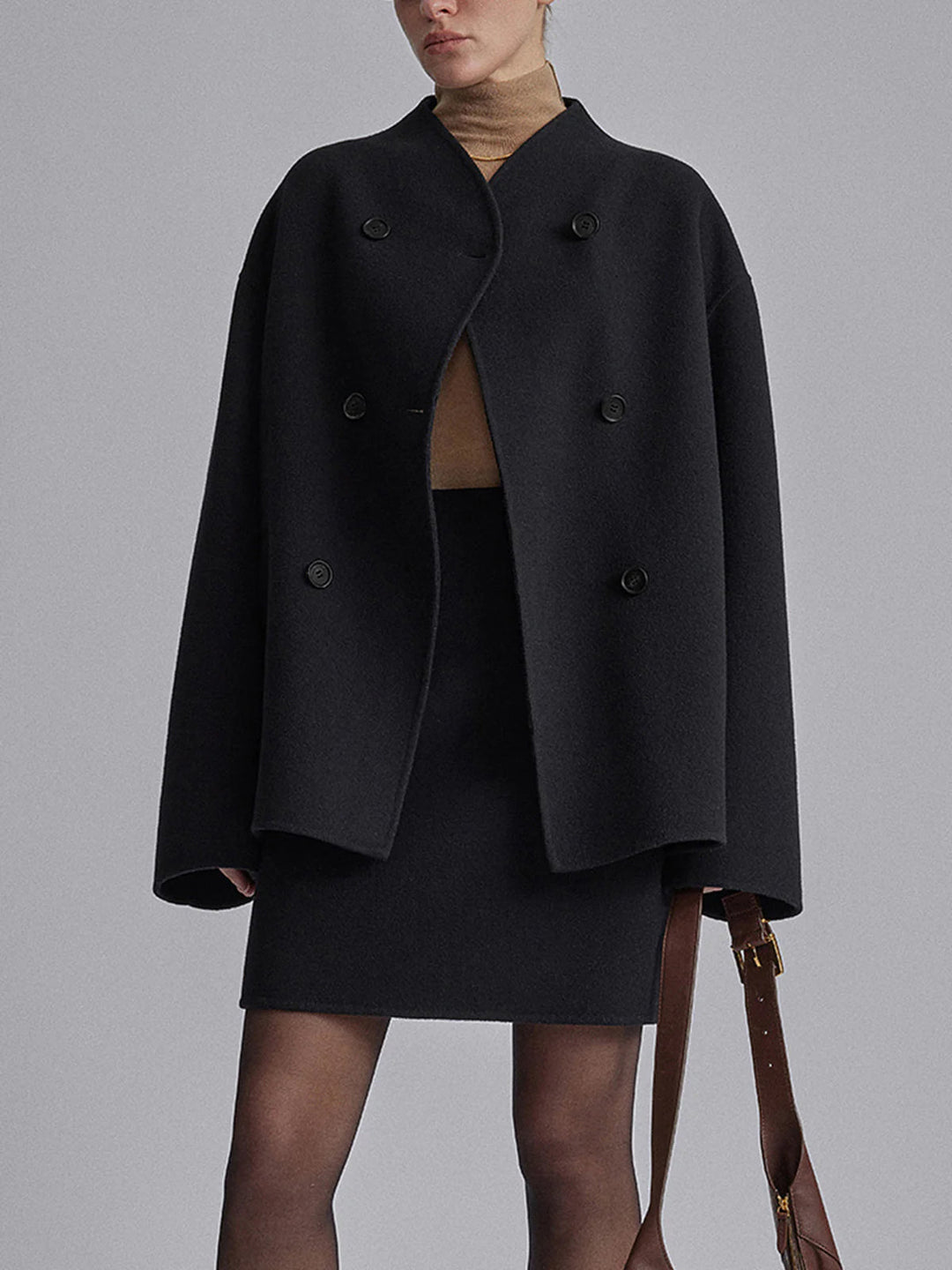 Manteau élégant pour femme avec boutons et coupe ample