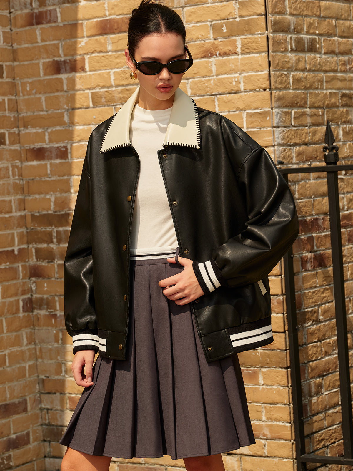 Blouson style bombardier aspect cuir col