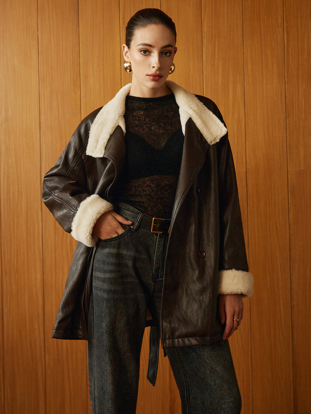 Veste en cuir élégante pour femme avec détails de ceinture
