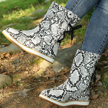 Bottes élégantes femme mi-mollet daim