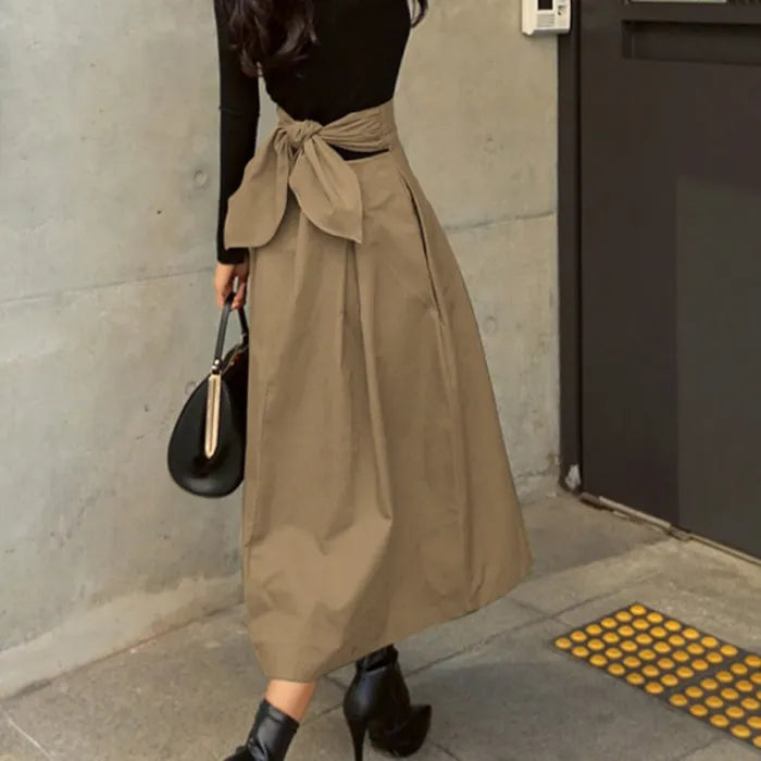 Jupe midi élégante taille haute avec nœud